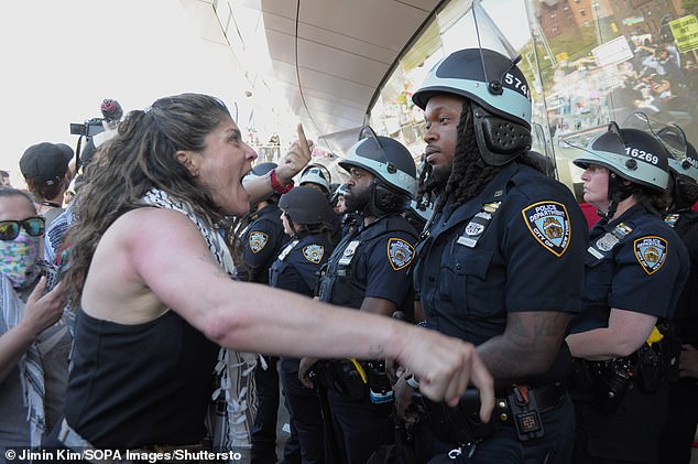 Some 34 people were arrested in the museum protest last month.