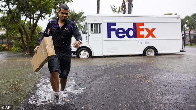 Parts of the Sunshine State were drenched in up to ten inches of rain on Tuesday, as more than a month's worth of rain fell in a single night.