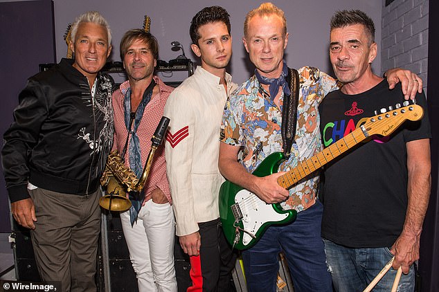 Wild (third from left), who replaced Tony Hadley as the '80s band's singer in 2018 before being fired 11 months later, was arrested by officers at his home on March 30, 2021.