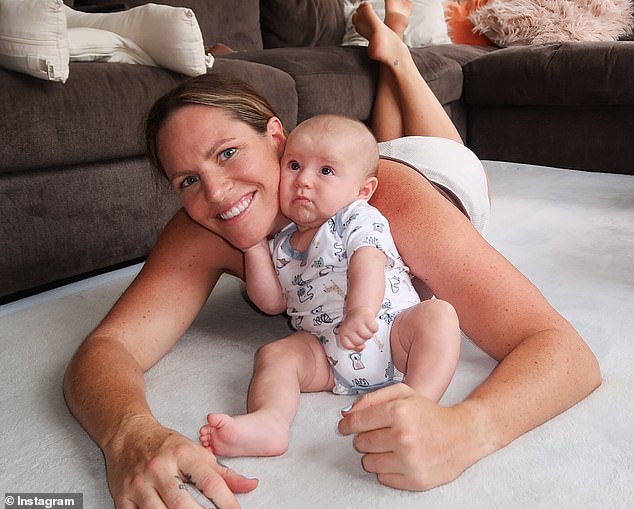 Australian swimming champion Emily Seebohm with her son Sampson