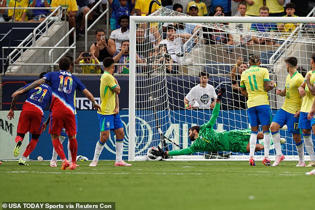 Pulisic (10) was able to beat a diving Alisson at his right post to equalize for the United States.