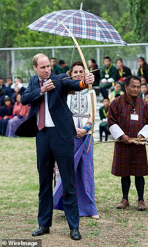 Samir explained that Kate was wearing traditional clothing and moved to move directly in front of where she was shooting to get this shot.