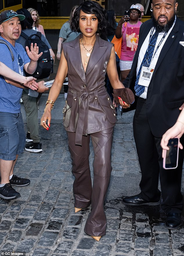 The Little Fires Everywhere actress attended the 2024 Tribeca Festival in New York City wearing a low-cut brown belted leather dress vest and matching flared leather pants.