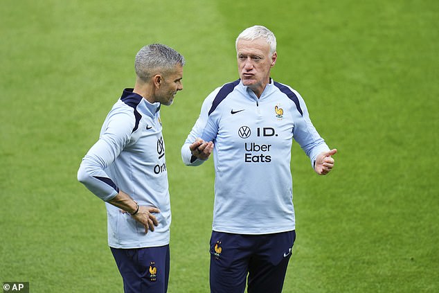 Coach Didier Deschamps (right) is among the members of the group affected by the virus.