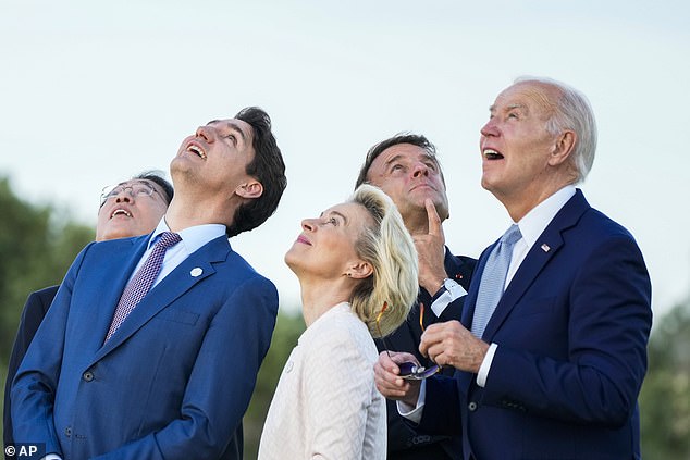 From right, US President Joe Biden, French President Emmanuel Macron, European Commission President Ursula von der Leyen, Canadian Prime Minister Justin Trudeau and Japanese Prime Minister Fumio Kishida watch a skydiving demonstration during the leaders' summit G7 World Cups in Borgo Egnazia, Italy, on Thursday. June 13, 2024