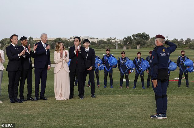 French President Emmanuel Macron, British Prime Minister Rishi Sunak, US President Joe Biden, Italian Prime Minister Giorgia Meloni and Japanese Prime Minister Fumio Kishida attend a flag ceremony during the G7 summit in Borgo Egnazia, Brindisi, Italy, June 13, 2024