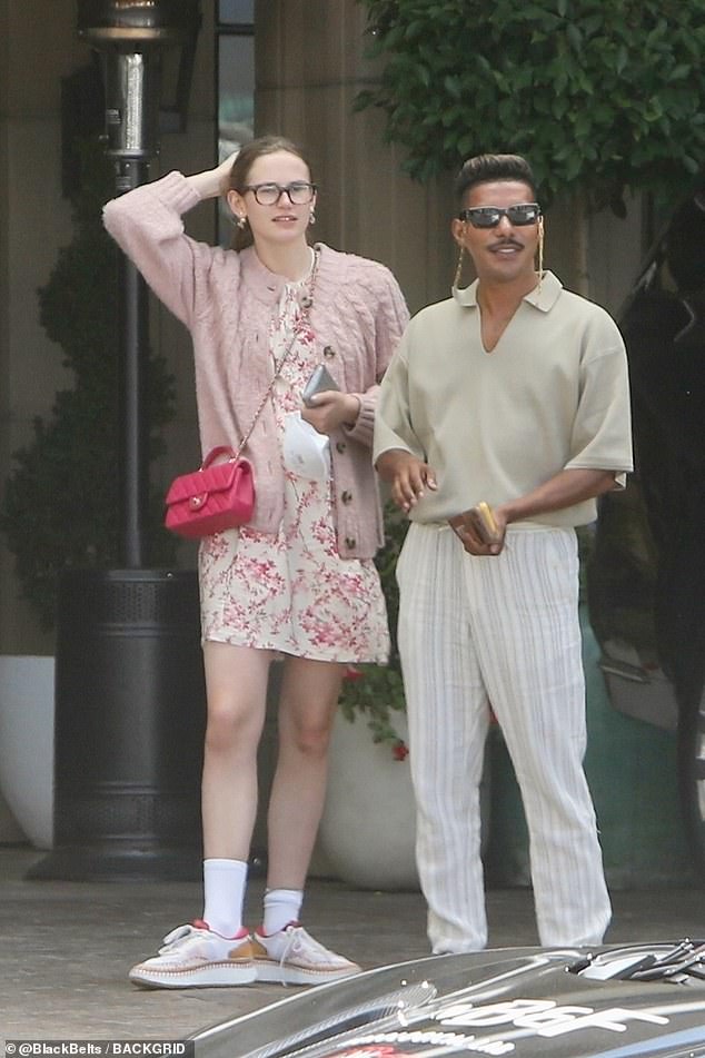 Violet stood outside in a sweater and pink dress after her lunch with JLo.