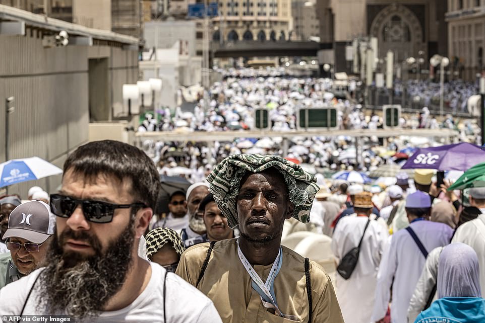 Muslim pilgrims can be seen arriving at the holy city of Mecca in Saudi Arabia on Tuesday