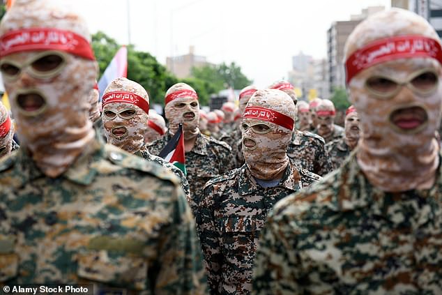 Members of the Islamic Revolutionary Guard Corps (IRGC) march during the annual pro-Palestinian Al-Quds, or Jerusalem, Day demonstration in Tehra. April 29, 2022