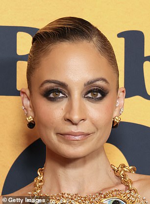 Modern girls like Nicole Richie don't wait for a formal event to add sparkle to their outfit.