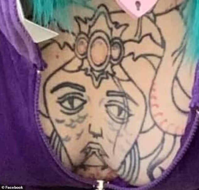 This image, originally shared on Facebook, appears to show a questionable face on a woman's chest.