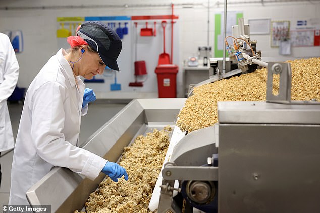 The royal mother-of-two looked focused as she inspected the cereal produced by Jordans.