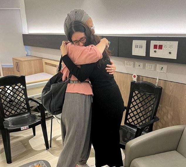 Noa Argamani, one of four Israeli hostages rescued from Gaza by the IDF on Saturday, has been photographed hugging her boyfriend's mother. The 26-year-old was photographed hugging Ditza Or, the mother of Avinatan Or, who is one of several people taken hostage by Hamas on October 7 and taken to Gaza.