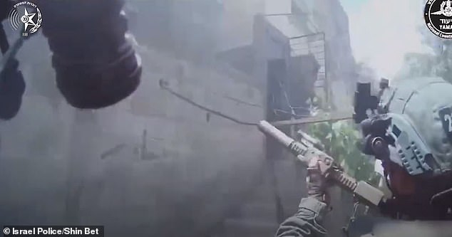 Special forces made up of undercover Yamam and Shin Bet agents surround one of two heavily guarded buildings in Al Nuseirat, Gaza.