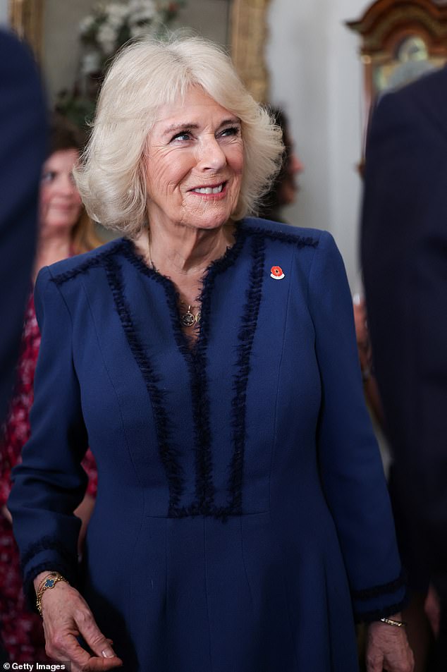 Camilla greets guests at Clarence House to celebrate the centenary of The Poppy Factory, which was set up to provide employment opportunities for soldiers wounded in the First World War.