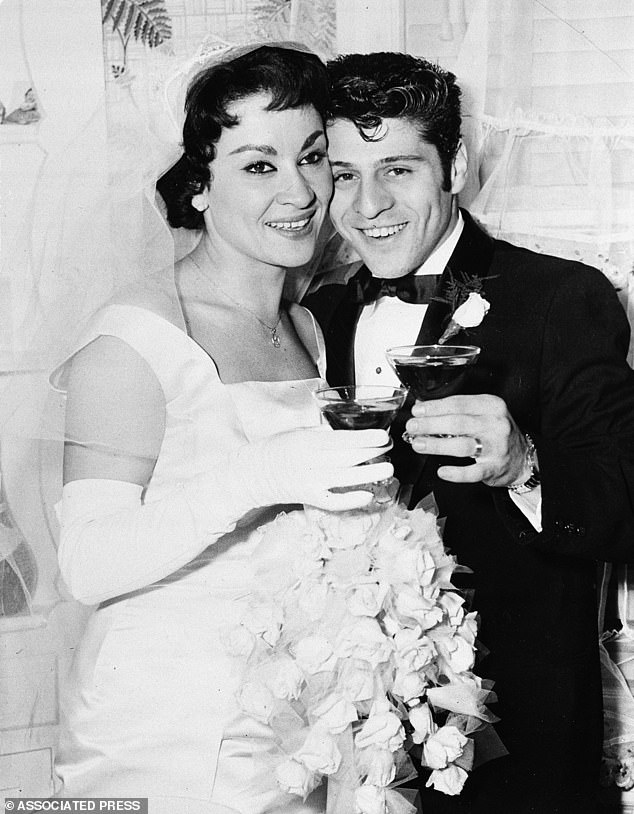 Tony is pictured with his wife Chita on their wedding day in 1957.