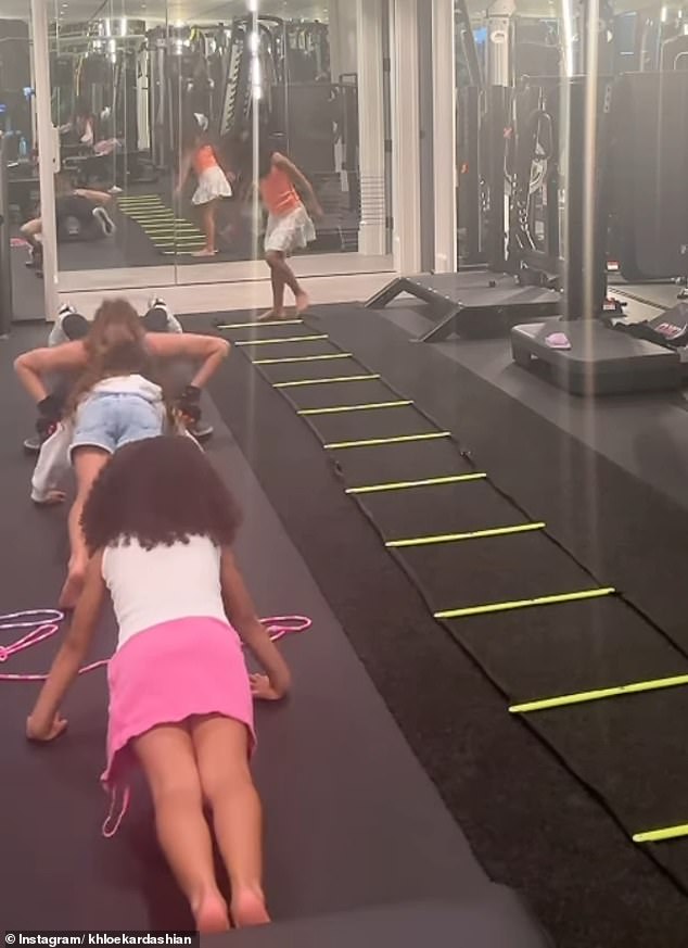 She was adorably joined by her daughter True, six, and nieces Chicago, six, and Dream, seven, during her final workout.