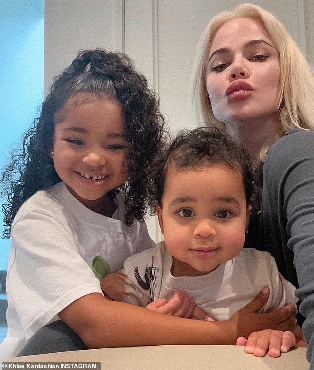 Khloe shares daughter True and son Tatum, one, with her former NBA player boyfriend, Tristan Thompson; In the photo with her two children.