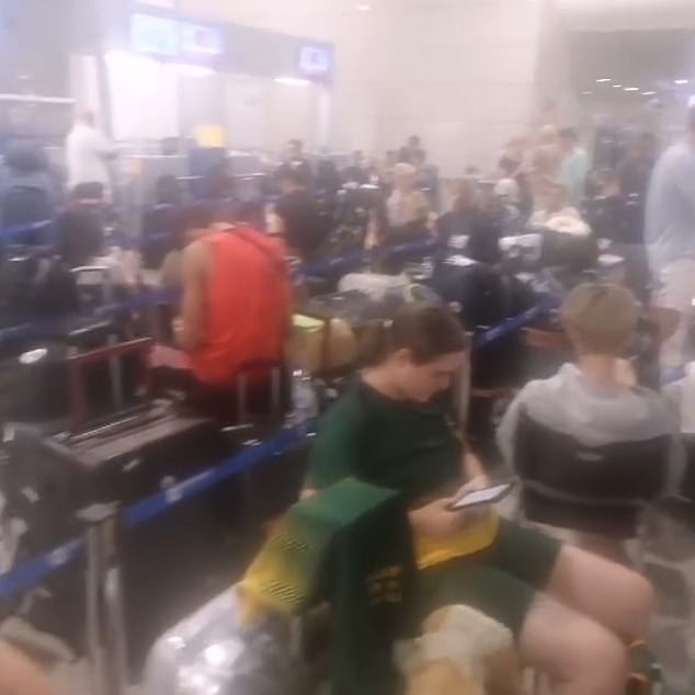 Another video shows hundreds of people waiting inside the airport at check-in with their luggage.