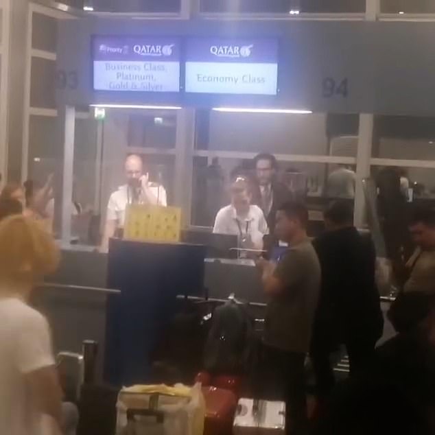 Despite the crowd of waiting passengers, only two workers were seen working behind the check-in counter.