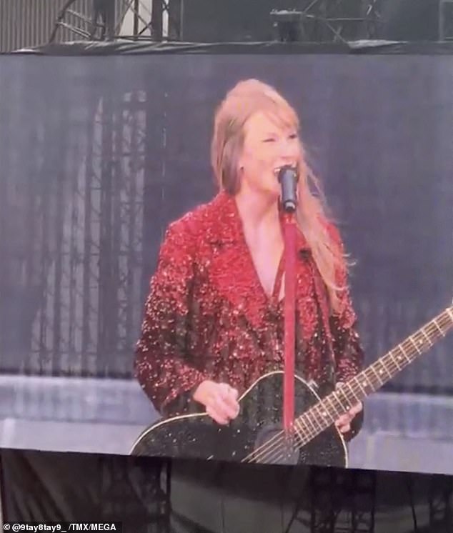 The pop icon, 34, wowed in a bright red blazer and a guitar in her hands.