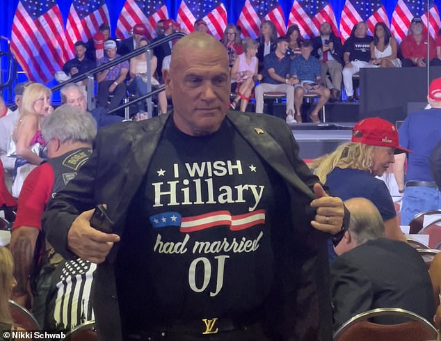 A supporter who attended former President Donald Trump's birthday event in Florida on Friday night wore a T-shirt that read: 