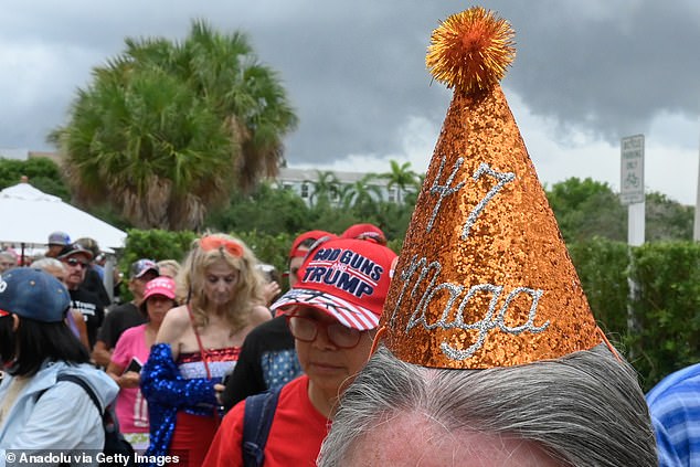 Several supporters wore homemade Trump birthday hats emblazoned with MAGA slogans.