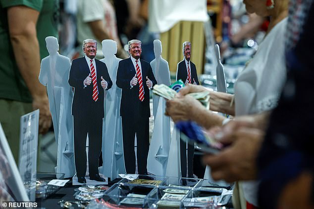 Cardboard cutouts of the birthday boy were sold in the back of the convention center before the former president's appearance.