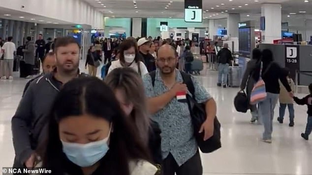 A long queue formed from the immigration gate to the terminal as the ABF attempted to resolve the issue. Image: X