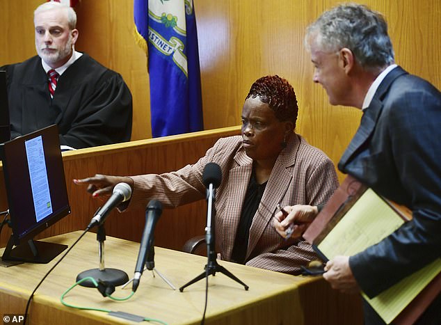 Wanda Geter-Pataky, center, seen giving testimony in court during a challenge to the results of the 2023 primary election, where she was accused of vote tampering.