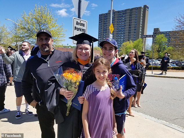 Defreitas was praised for his extensive charity work, which included hosting monthly dinners for a local homeless shelter. He appears here with his two children.