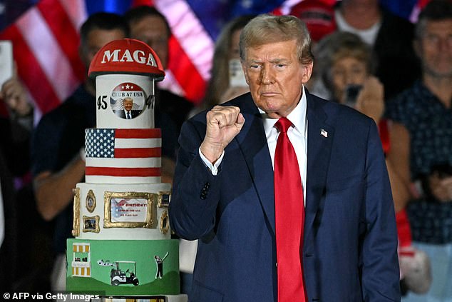 Donald Trump gestures next to his birthday cake, created by Club 47, during a campaign rally as he celebrates his 78th birthday at the West Palm Convention Center in West Palm Beach on Friday.