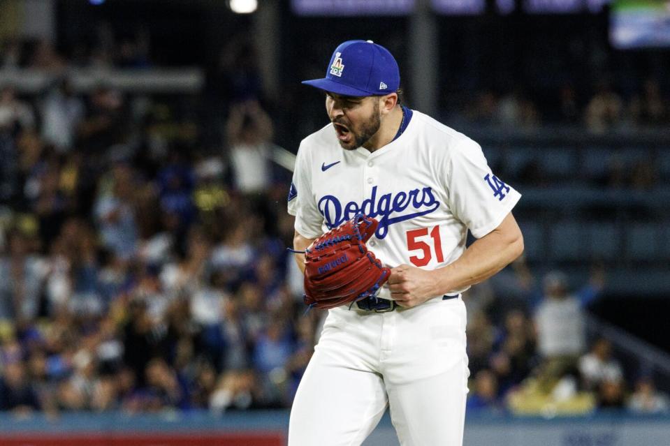 Dodgers reliever Alex Vesia reacts after making a save to close out a 4-3 victory over the Royals on Friday.