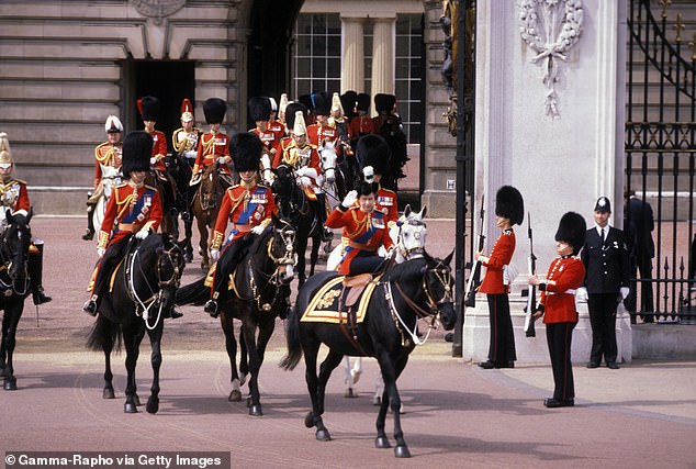 The Queen rides her Burmese horse during Trooping the Colour, 1981