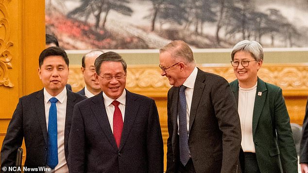 Albanese became the first Australian prime minister to visit China since 2016 after flying to Beijing in November. He is pictured with Chinese Premier Li Qiang.