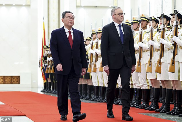 Prime Minister Anthony Albanese will host Chinese Premier Li Qiang during part of his trip (pictured, the pair met in China late last year)