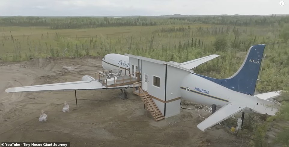 Footage from the short film shows how the plane is now supported by sturdy pillars, with one of the wings converted into a balcony, while a set of stairs and a porch extension create a more traditional style entrance.