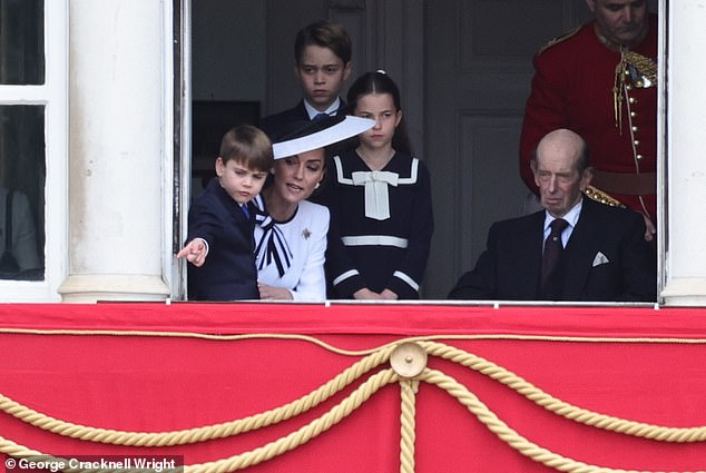 Prince Louis points out something during Trooping the Color event