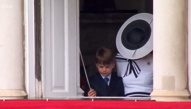 Prince Louis was seen playing with a curtain cord as he asked his mother: 