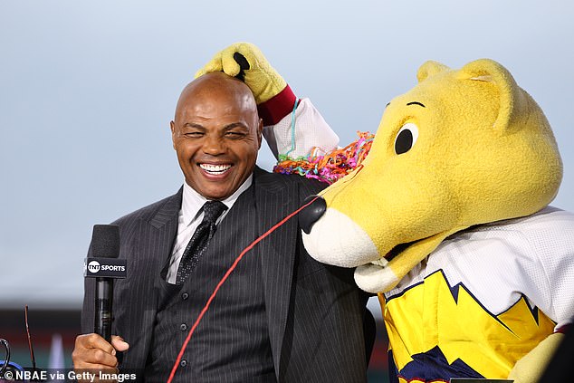 Chuck interacts with the Denver Nuggets mascot at the start of the 2023-24 NBA season