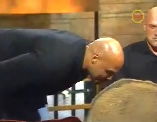 Charles Barkley kisses Kenny Smith's donkey after losing a bet during the 2002-03 season