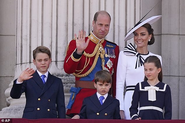 Prince George waves from the balcony of Buckingham Palace, accompanied by his father, Prince William, his brother, Prince Louis, his mother, the Princess of Wales, and his sister, Princess Charlotte.