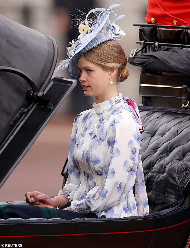 Lady Louise is photographed while riding in the carriage on the way to Trooping the Color