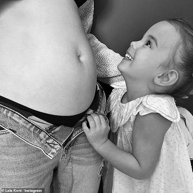 She announced her latest pregnancy last month, posting a touching snap of her three-year-old daughter Ocean smiling at her growing belly.