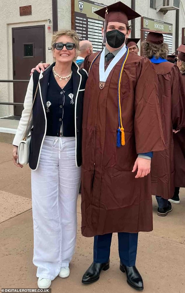 In the years after Sharon and Phil's divorce, she adopted two more children, bringing Laird home in 2005 and Quinn in 2006; Sharon and Laird photographed at their high school graduation in May