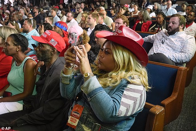 The overwhelmingly black congregation was joined by white Trump supporters on Saturday.