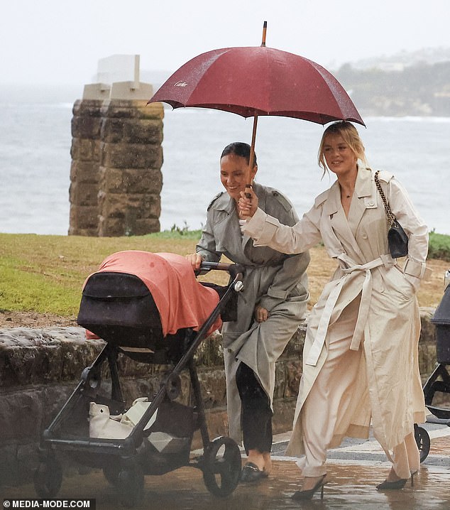 She was joined by her sisters Madeline and Anna, who also welcomed the rainy outing with grace.