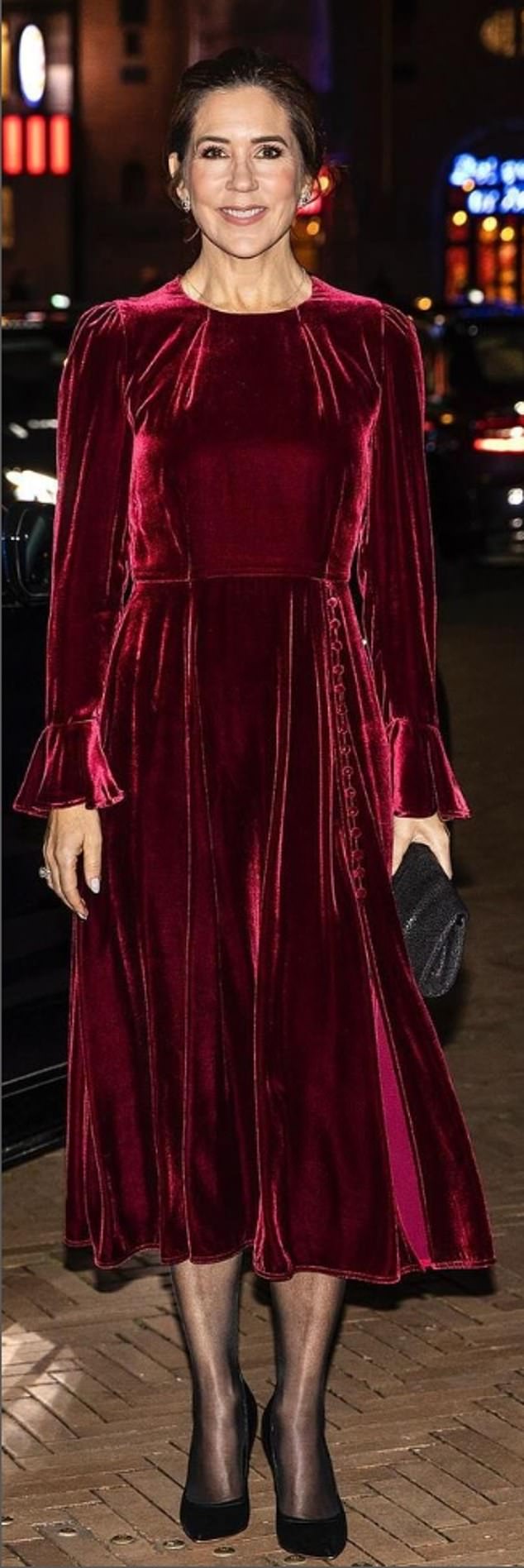 Expressing her commitment to sustainability, Queen Mary wore a berry velvet dress by Beulah London in 2022.