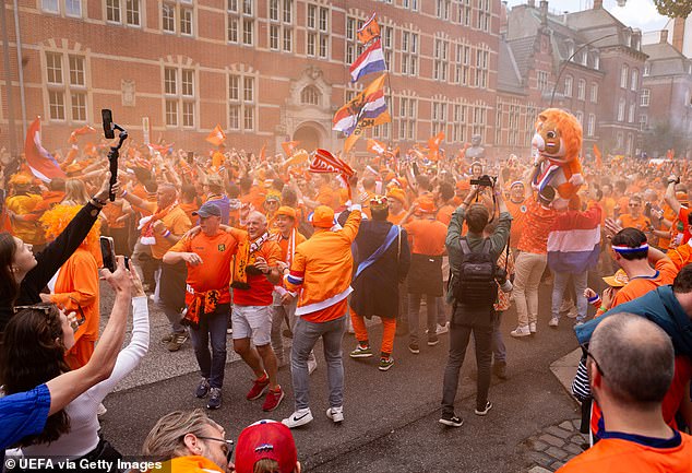 Dutch fans are pictured during their Fan Walk in the official UEFA Fan Zone.