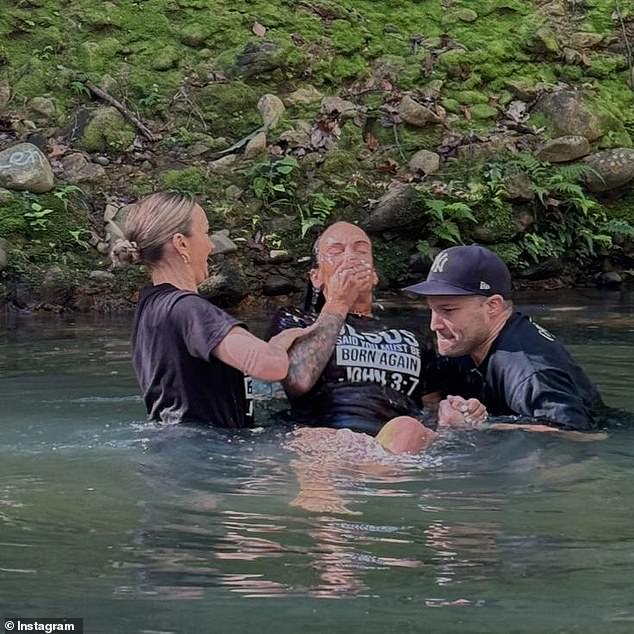 The 37-year-old shared images of her baptism in a picturesque lake, helped by two people who appeared to be ministers. Hayley was wearing a black shirt that said: 